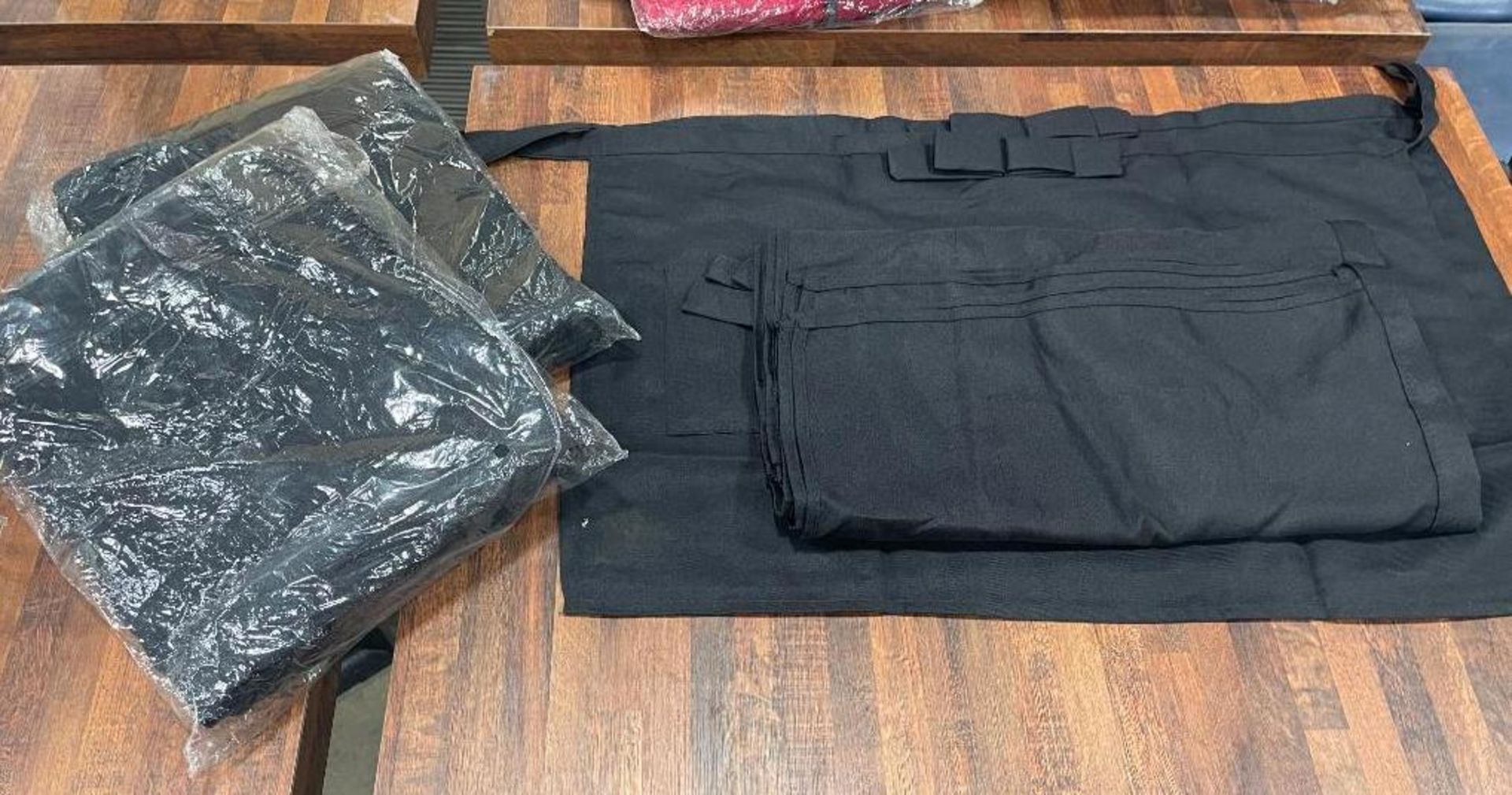 LOT OF BLACK WAIST APRONS