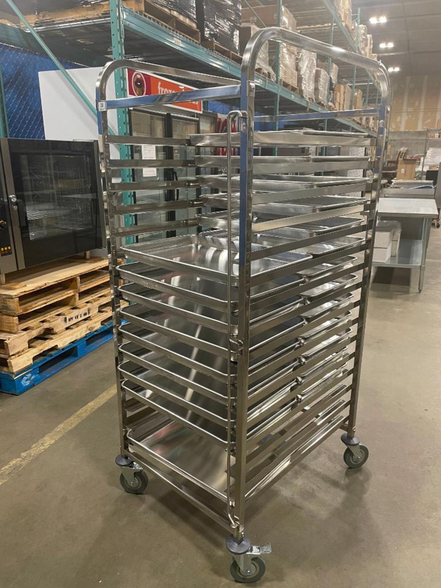 NEW STAINLESS STEEL 16-SLOT OVERSIZED BUN PAN RACK WITH PAN GUARD & (22) PANS - Image 2 of 9