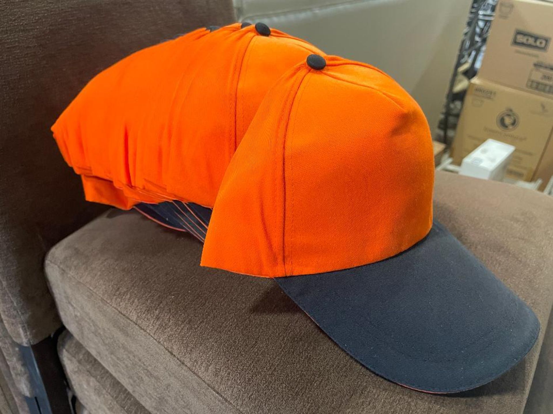 LOT OF (18) ORANGE HATS