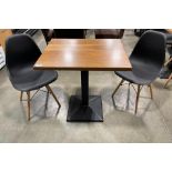 30" X 24" WOOD TOP SINGLE PEDESTAL TABLE WITH (2) BLACK PLASTIC BACK CHAIRS