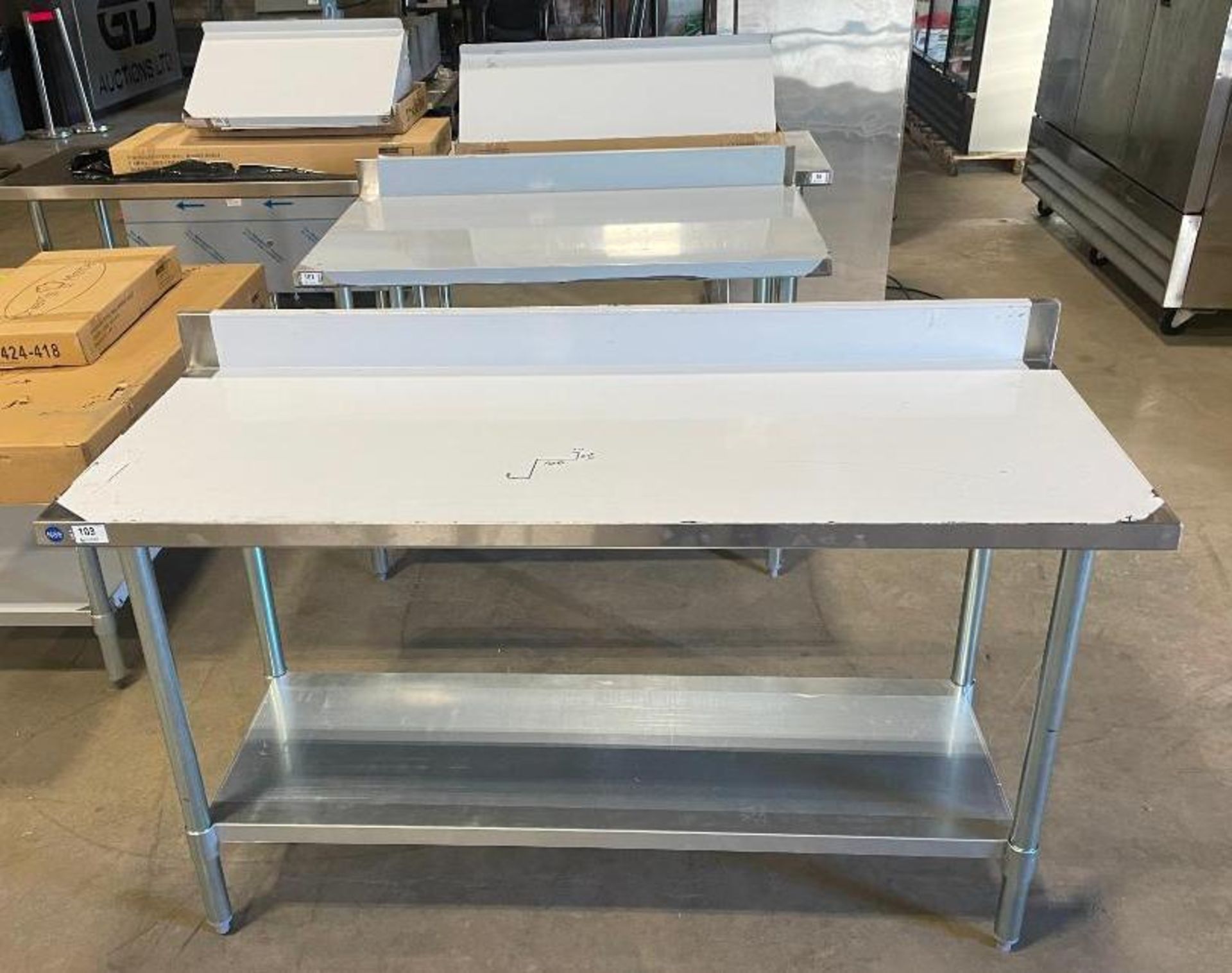 NEW 24" X 60" STAINLESS STEEL WORK TABLE WITH 4" BACKSPLASH & UNDERSHELF - Image 4 of 5