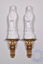 A PAIR OF CHINESE BLANC-DE-CHINE FIGURES OF GUANYIN, QING DYNASTY, KANGXI PERIOD