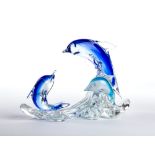 Glass sculpture depicting dolphins