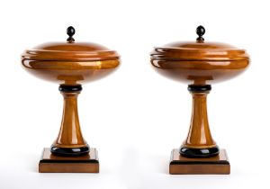 Pair of Biedermeier wooden vases with square base, round and flat shape and with lids.