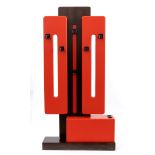 Luigi Sormani 1932-2017 Space Age. Coat hanger with elements in red lacquered wood.