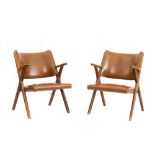 Dal Vera pair of armchairs with upholstered leather seats and backs