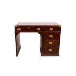 Byron marine style mahogany desk with five drawers on the front and glass top