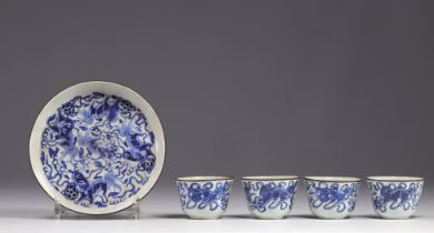 Tea service with tray and 4 bowls in white and blue porcelain decorated with dogs