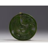 China - green jade pendant with Phoenix design, 14K gold mount, Qing period.