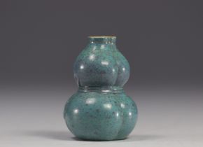 China - double gourd vase in partridge egg color.
