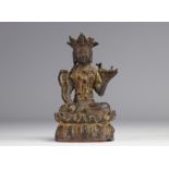 Statue of a traditional seated figure in bronze originating from China from the Ming period (æ˜Žæœ