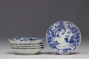 China - set of six white and blue porcelain saucers, Kangxi period.