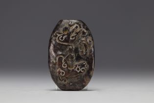 China - Carved jade pendant with Chilon decoration.