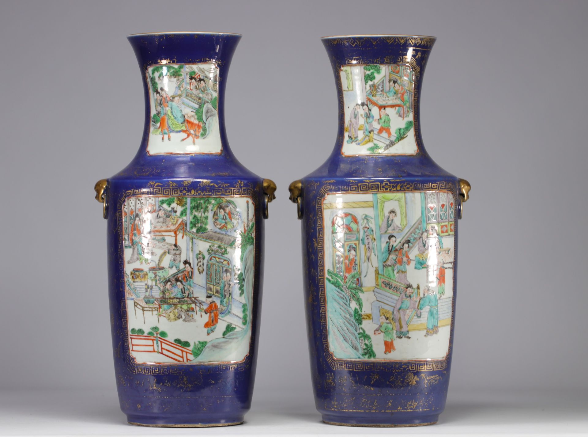 Large pair of blue powdered porcelain vases decorated with scenes of life from the 19th century