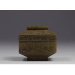 China - covered box in carved jade with archaic decoration.