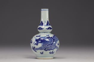 China - white and blue porcelain vase decorated with "Dragon chasing the sacred pearl".