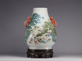 A rare and important Famille Rose porcelain "Hundred Deer" vase with the six-character Qianlong mark