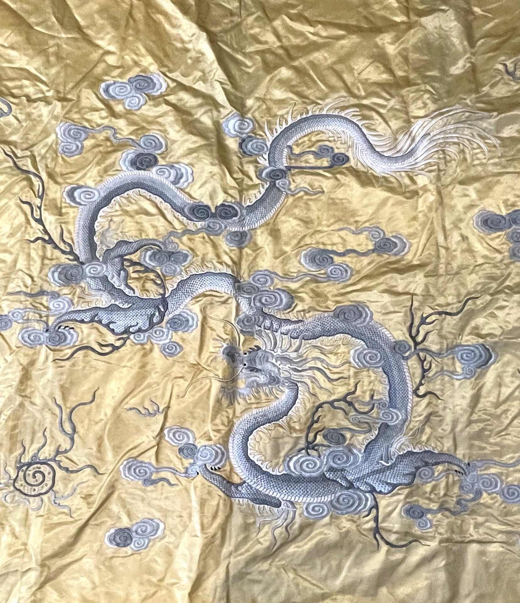 China - Gold silk tapestry decorated with blue dragons. - Image 2 of 2