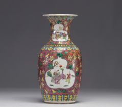 China - Famille rose porcelain vase decorated with figures.