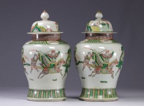 Pair of covered potiches of the green family decorated with warriors