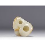 White and rust jade brushes carved in the shape of a fruit, Qianlong period, 18th century