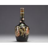 China - Black family porcelain vase decorated with figures and horsemen, Kangxi mark.