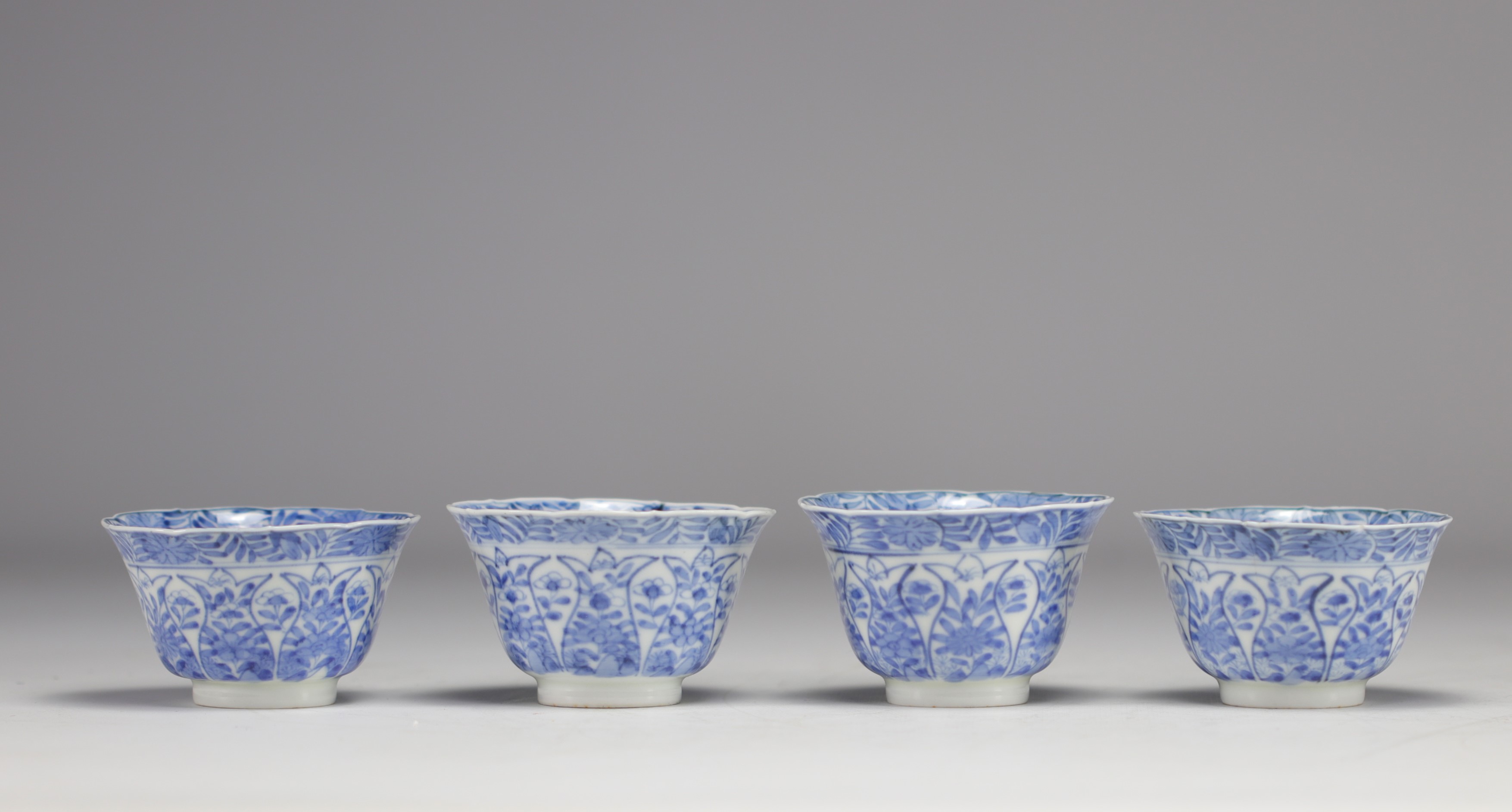 Set of white and blue bowls and saucers with various flower decorations from 18th century - Image 5 of 6