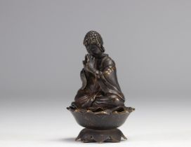 Sculpture of a bronze Buddha resting on a lotus flower from Qing period (æ¸…æœ)