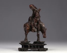 Wooden "root" sculpture of a figure on horseback from China, late 18th century