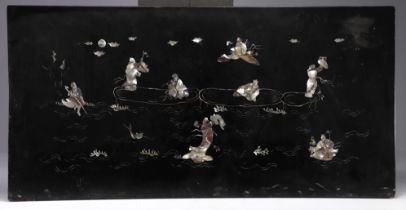 Southern China, Vietnam - A lacquer and mother-of-pearl panel decorated with figures at the water's