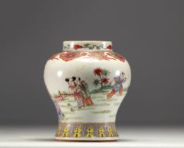China - Famille rose porcelain vase decorated with women and children.