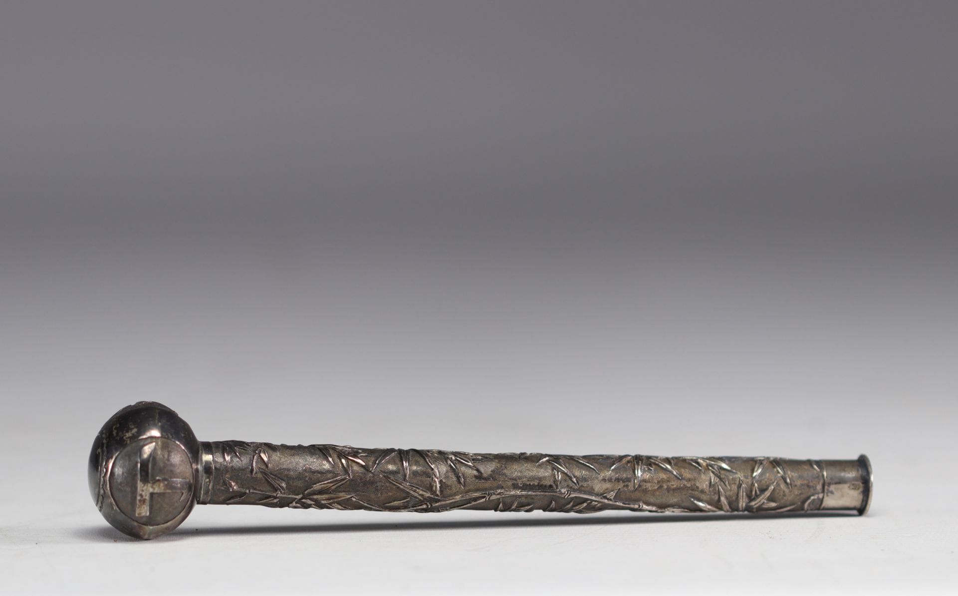 China - Silver parasol handle with bamboo decoration.