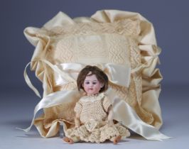 Small porcelain doll head debossed with "Made in Germany" 12/0.