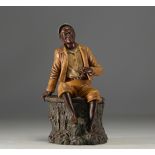 Bernhard BLOCH (1836-1909) "Young African with cigar" Beautiful polychrome terracotta tobacco pot.