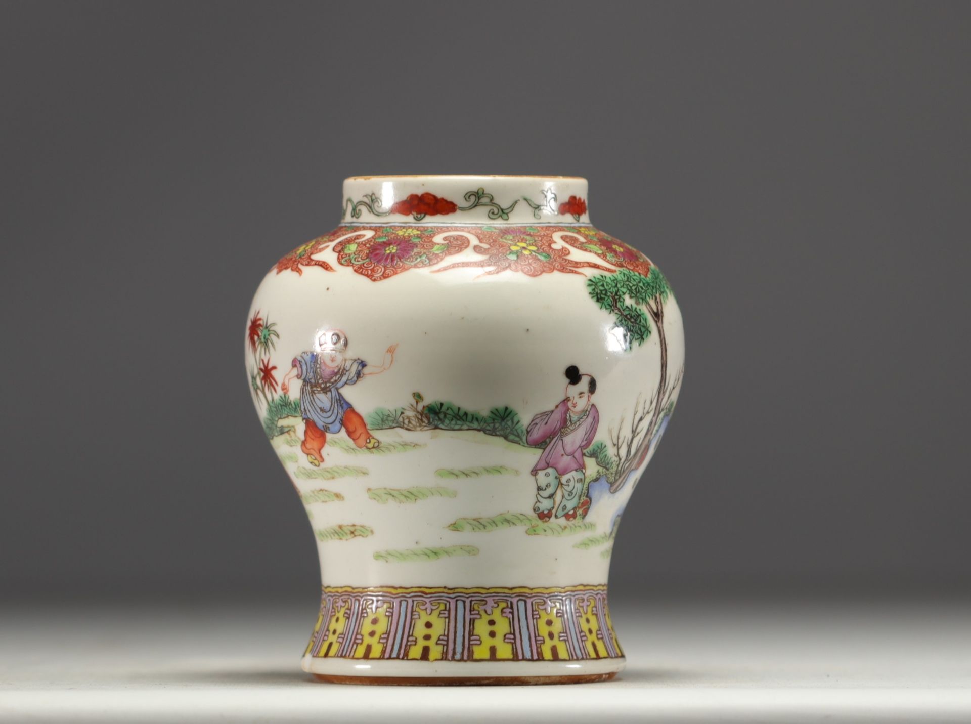 China - Famille rose porcelain vase decorated with women and children. - Image 3 of 4