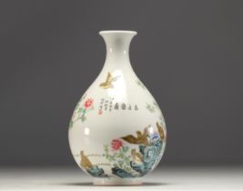 China - A Republic-period porcelain vase decorated with quail and calligraphy.