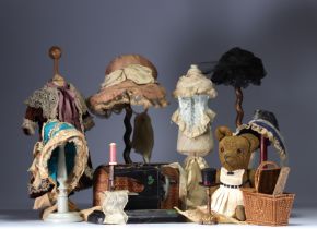 Set of various doll accessories, clothes, headdresses and children's games, including a small tin se