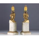 Pair of white marble and gilt bronze lamps with Caryatid faces, Empire period.