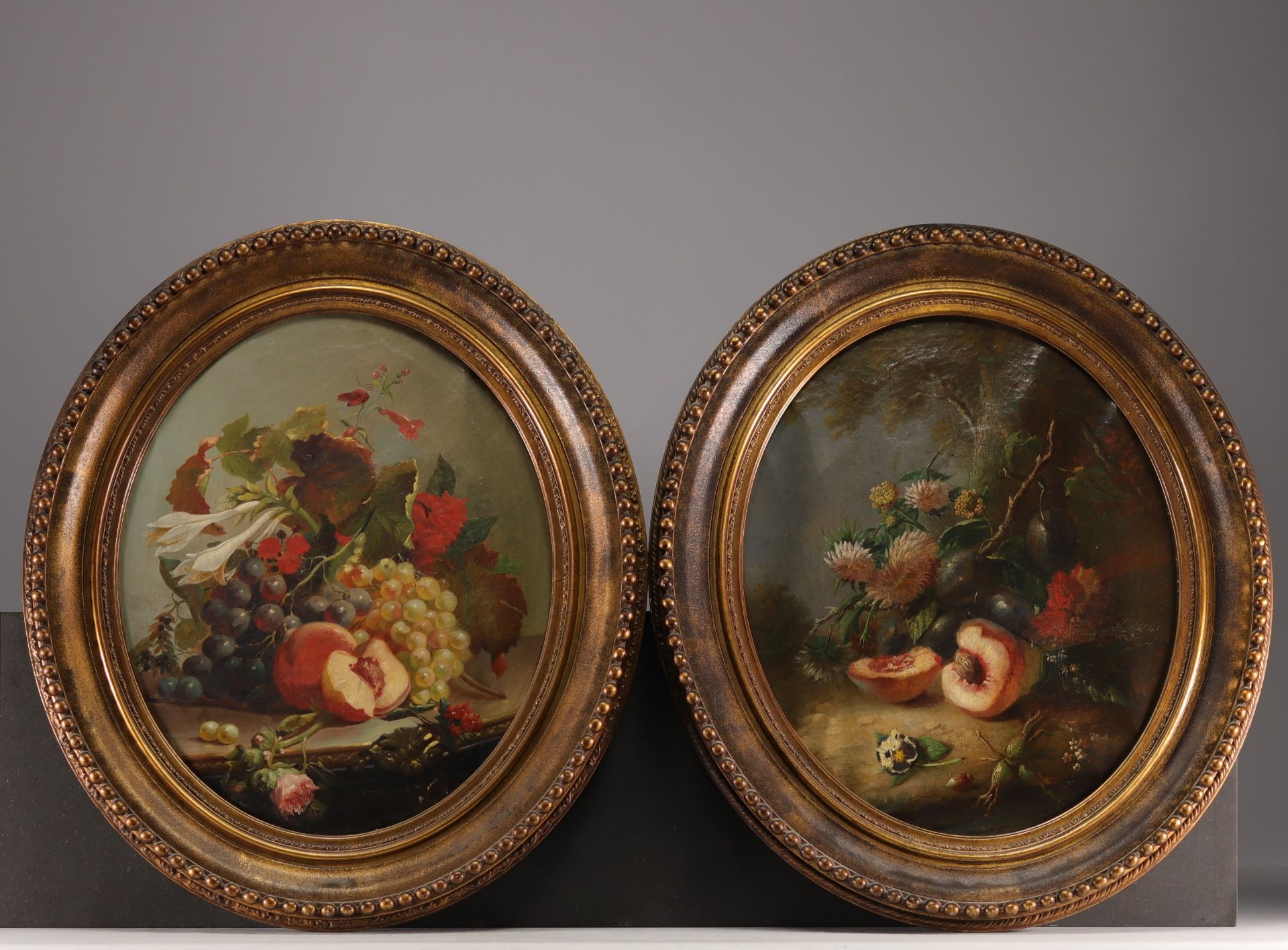 Pair of still lifes with fruit and flowers, oil on canvas, 19th century.