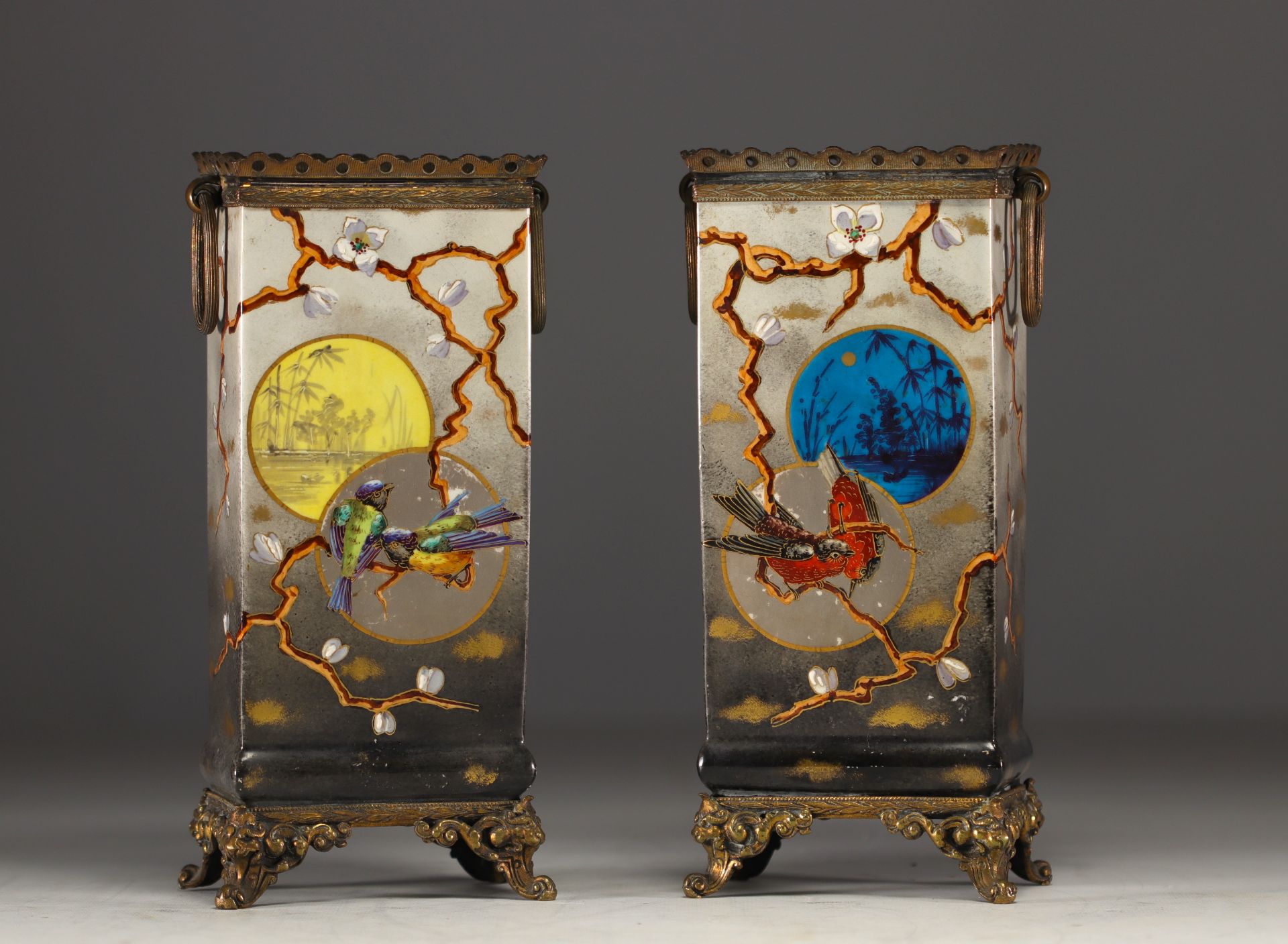 A pair of "Japanese inspired" earthenware vases with bronze mounts, French work from the Napoleon II