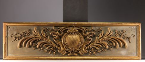 Large piece of carved and gilded wood panelling from the 18th century.