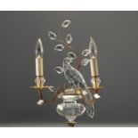 Maison BAGUES - Wall light with two brass and crystal arms decorated with a parrot.