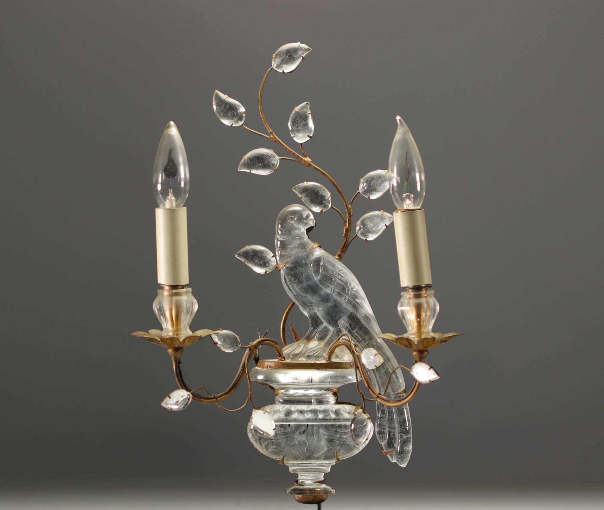 Maison BAGUES - Wall light with two brass and crystal arms decorated with a parrot.