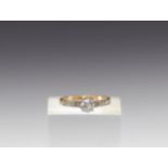 Ring in 18k gold with a central 0.5 carat diamond weighing 2.4g.