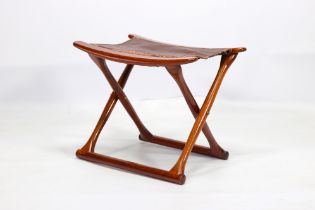 Curule mahogany and leather stool circa 1960.