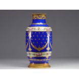 Blue Sevres porcelain vase decorated with flowers and mounted in bronze