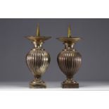 Pair of silver-plated brass candle-holders.