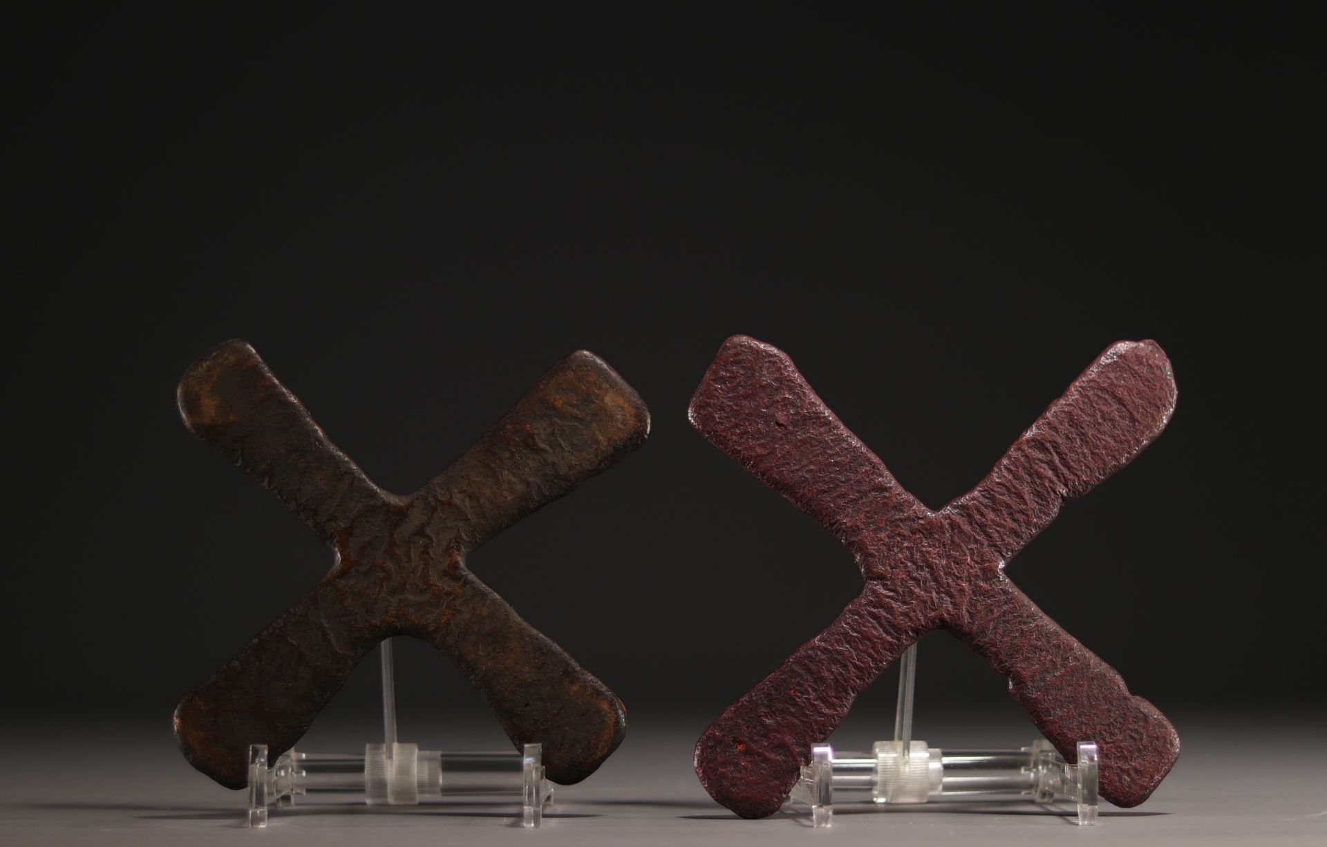 Set of two Katanga cross coins, early 20th century.