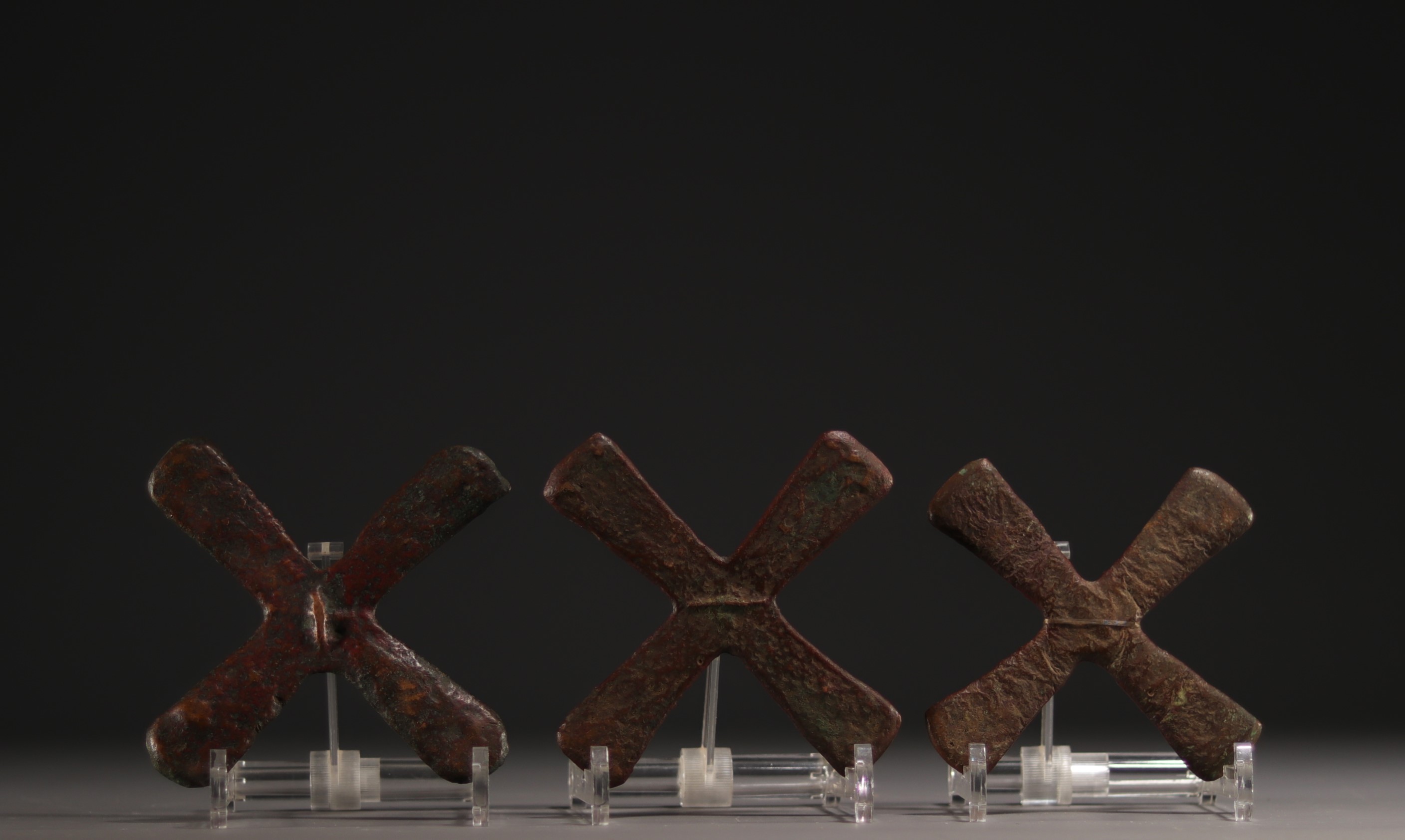 Set of three Katanga cross coins, early 20th century.