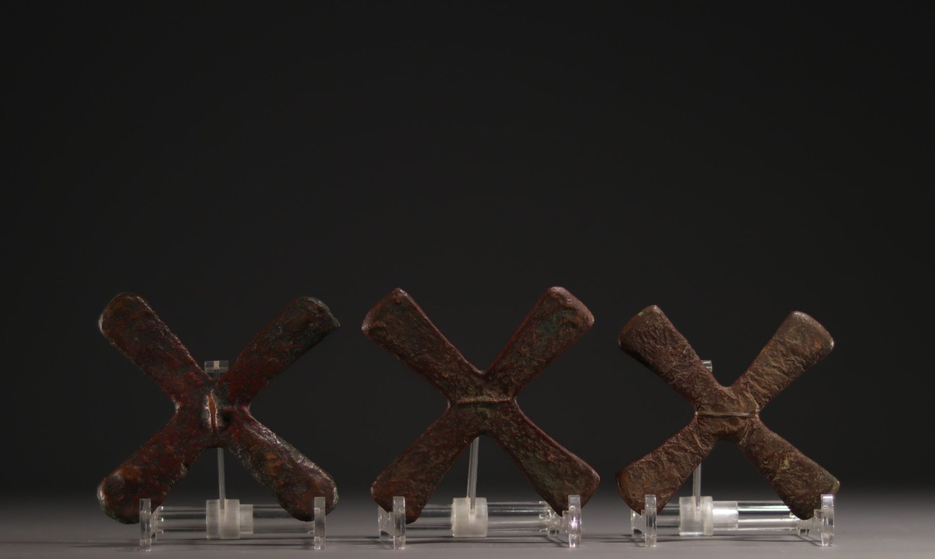 Set of three Katanga cross coins, early 20th century.